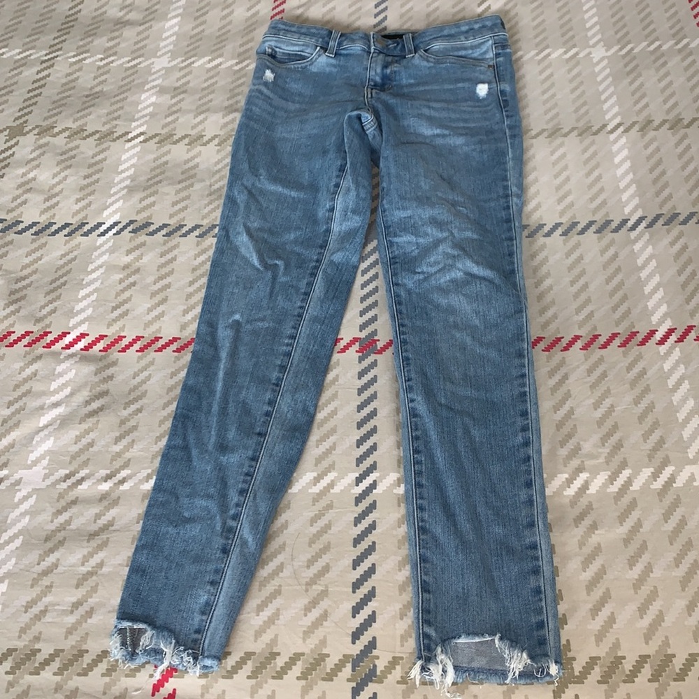 Uniqlo light blue distressed skinny jeans